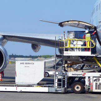 a ULD containing air freight, air cargo, being loaded on the lower deck of an airplane for air freight transport. Used on our air freight training, our air cargo online course.